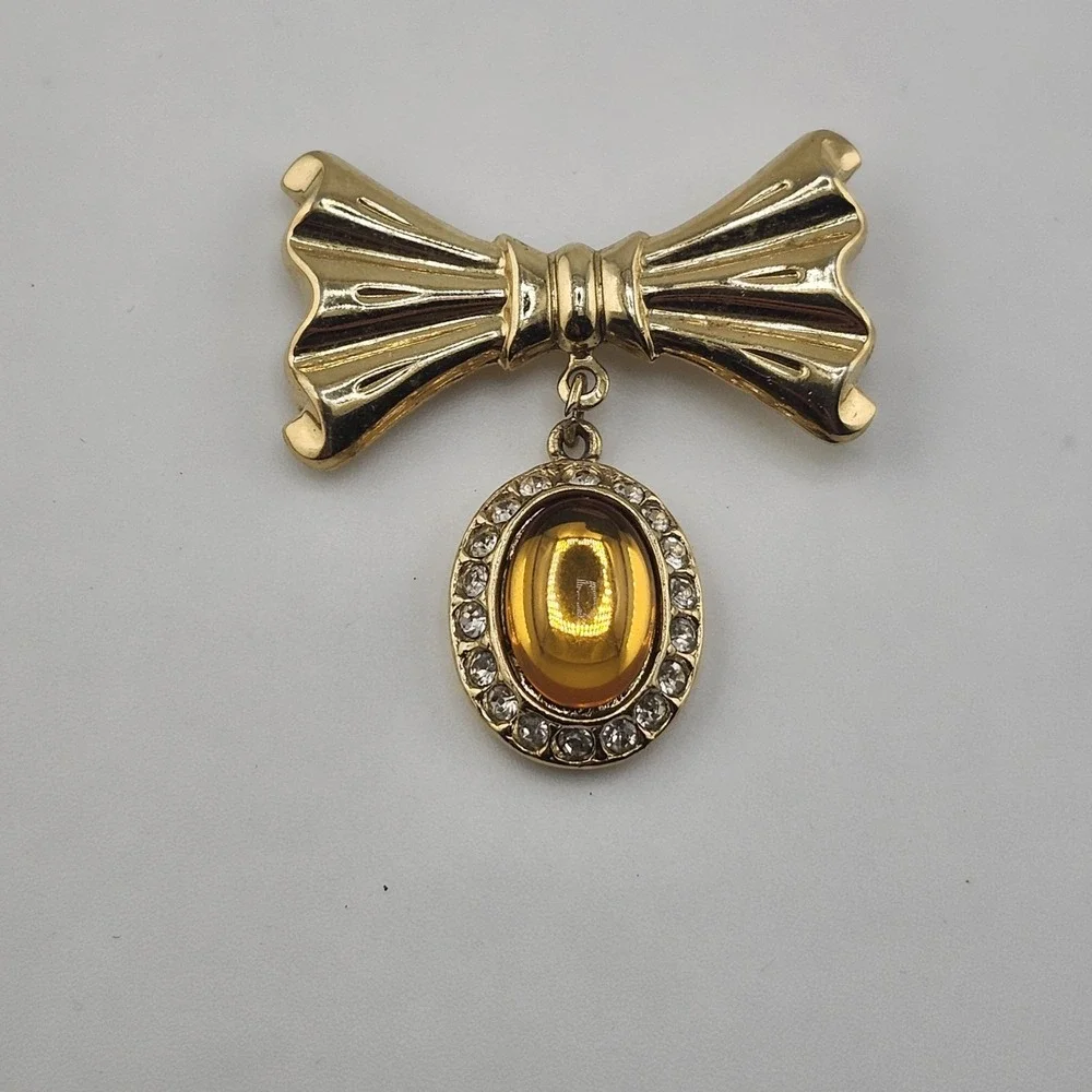 Vintage Gold Tone Bow With Amber Color Dangle Brooch‎ Pin